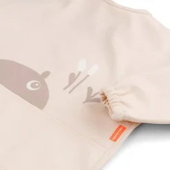 Hagesmæk med ærmer og lomme